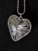 Heart Shaped Silver Tone Pendant And Chain