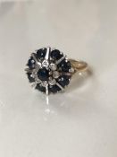 9 carat gold sapphire and diamond cluster ring
