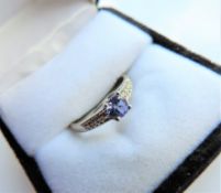 Sterling Silver Tanzanite & Diamond Ring