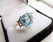 Sterling Silver 4 carat Emerald Cut Blue Topaz Ring