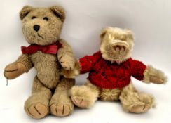 2 Vintage Teddy Bears     2 Vintage Teddy Bears.The largest measures 12 inches long and has moveable