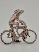 Silver Frog On A Bicycle Ornament