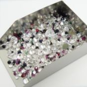 An assortment of over 150 unmounted stones totalling 89.79 carats