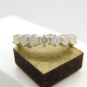 An 18ct white gold 7-stone 0.50 carat diamond ring with World Gemological Institute certificate