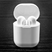 (R2I) Contents Of Box. A Qty Of Red5 He Wireless Earbuds.