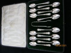 Antique Cased Set Of Twelve Sterling Silver Teaspoons & pair Of sugar nips 1901.