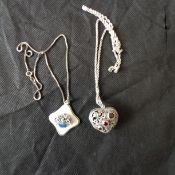 Two silver pendants