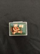 Silver pillbox with painted enamel.