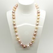 A necklace strung with peach, white, champagne and grey freshwater pearls with 9ct yellow gold clasp