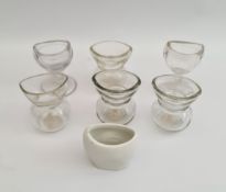 Vintage Antique 6 x Clear Glass Eye Baths & 1 Ceramic. The tallest measures 2.25 inches tall.