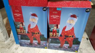 (7P) 2x Skiing Santa Light Mains Operated RRP £25 Each.