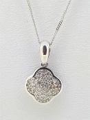 9ct (375) White Gold pave Set Diamond Flower Pendant on Curb Chain - 18
