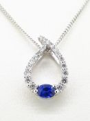 18ct (750) White Gold Open 0.32ct Sapphire & 0.24ct Diamond Pendant on Curb Chain - 18