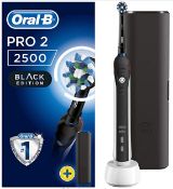 (13a) 2x Oral-B Items. 1x Pro-2 2500 Braun Black Edition RRP £39.45. 1x Pro-2 2500n & Travel Case R
