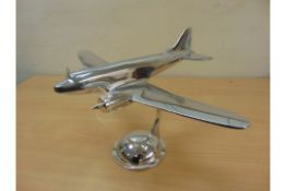 POLISHED ALUMINIUM DESKTOP MODEL OF A DC3 DAKOTA WITH ROTATING PROP DISCS