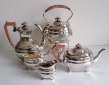 An Art Deco silver plated five piece tea/coffee service including a tea kettle by Roberts & Belk,