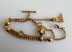 A gold fob rolo chain with orbs, T-bar, charm and clasp, stamped 9ct, 18.06g