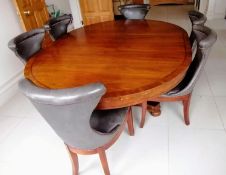 A Henredon for Ralph Lauren Polo oval extending dining table, plain frieze, one extra leaf on a