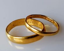 Two 22ct gold wedding bands, 5mm, 2mm, both size O and hallmarked, 6.89g