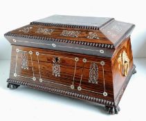 A Regency rosewood sarcophagus tea caddy converted to a jewellery box with mother of pearl inlay