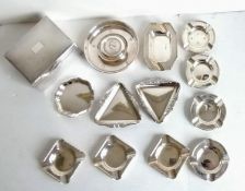 An assortment of twelve smaller silver ashtrays, mostly mid-20th century by Sanders & Mackenzie,