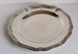 A late 19th century French circular silver platter with reeded border, hallmarked for Eugene