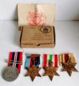 A WW2 medal group and three other medals without ribbons