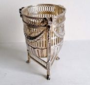 A Victorian silver pierced circular basket with swag and rams head decoration on hoof feet by George
