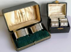 A pair of George V cased silver napkin rings with serrated edges by Samuel Walton Smith,