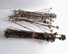 A collection of 50-60 iron Kissi Penny currency from Sierra Leone, each approximately 33 cm