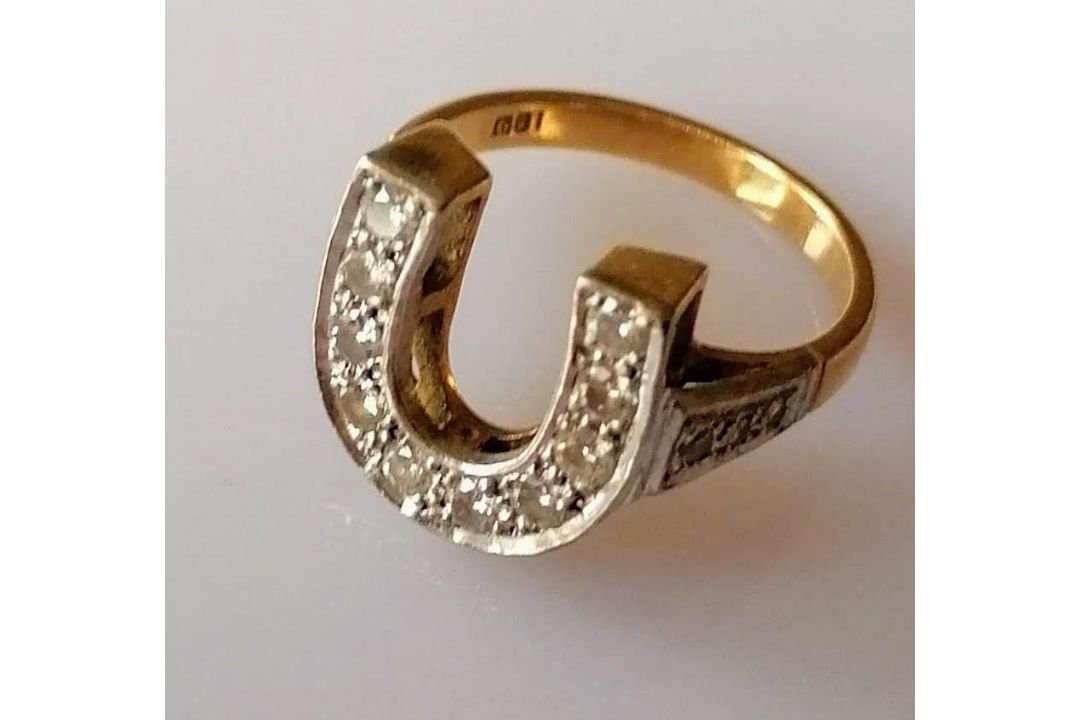 A mid-century yellow and white gold horseshoe-shape ring with pave-set diamond decoration, - Image 1 of 2