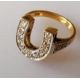 A mid-century yellow and white gold horseshoe-shape ring with pave-set diamond decoration, - Image 1 of 2