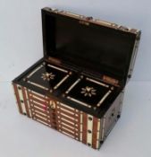 A 19th century ivory bound tea caddy with lidded interior, foil-lined compartments with key, 15 h