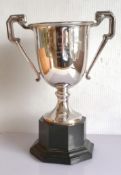 An Art Deco silver two-handled trophy cup on a spreading foot by William Neale & Son Ltd.,