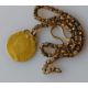 A George III gold sovereign, 1788, 8.6g on a gold chain, tests for gold, 9.65g. (total weight 18. - Image 1 of 2