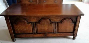 A Harrods Royal Oak Furniture blanket chest with hinged lid, arcaded front on turned feet, 53 h x