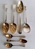 A George III silver fruit or berry spoon by William Bateman, 1815, 22 cm, a similar pair by Holland,