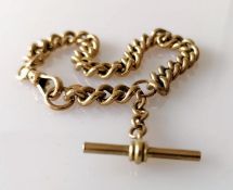 A vintage yellow gold Albert curb-link chain with T-bar and swivel clasp, unmarked, test for 9ct, 22