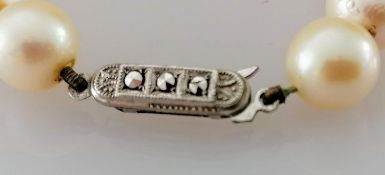 An Art Deco cultured pearl necklet comprising forty-three Akoya beads measuring 7.9mm to 8.5mm on