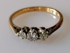 A vintage three-stone diamond ring, with graduated brilliant-cut diamonds, estimated total 0.25