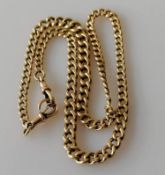 An Edwardian graduated gold curb-link Albert chain with two clasps, each stamped 9/375, maker's mark