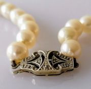 An Art Deco single row of fifty-one graduated cultured pearls measuring approx. 7.96mm to 10.35mm