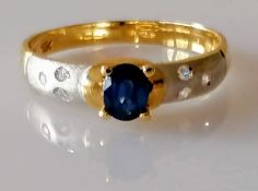 A mid-century oval mixed-cut sapphire gold ring, the sapphire measuring 5.04mm x 4.02mm x 2.48mm,
