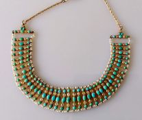An early 20th century turquoise, old-cut diamond and seed pearl bib necklace on a gold honeycomb