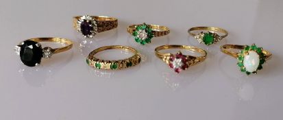 An assortment of seven 9ct gold gem-set rings, various sizes, all hallmarked, 11.88g