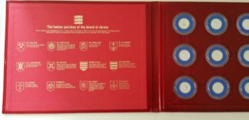 A set of twelve Jersey £1 coins commemorating each of the twelve parishes of Jersey, each in a