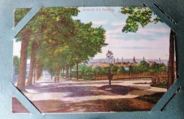 An assortment of Edwardian greeting cards and later topographical postcards of British towns/