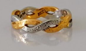 A yellow gold and platinum woven-style ring, size J, stamped 22ct, 3.64g