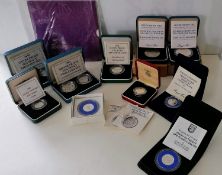 An assortment of commemorative coins to include: the Royal Mint Golden Jubilee Five Pounds Crown