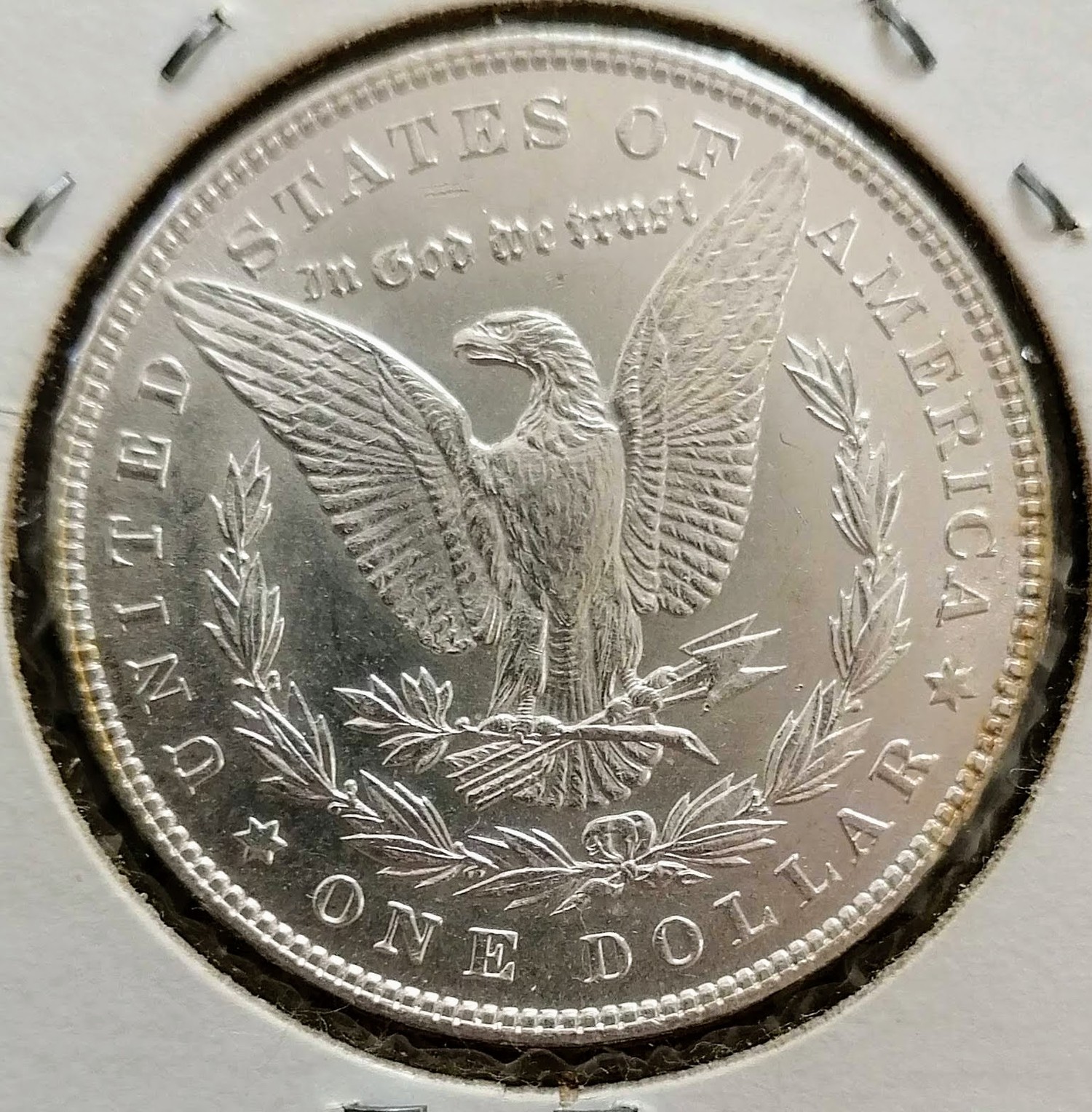 An 1886 Morgan one dollar coin, graded MS-60; three 1776-1976 quarter dollar coins, Denver mint - Image 4 of 4